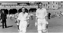 Load image into Gallery viewer, Peter May going in to bat for England against the West Indies in 1957