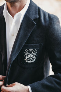 Close up of the N.E. Blake & Co. Peter May Cricket Shirt worn under a vintage blazer