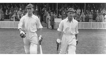 Load image into Gallery viewer, 1938: English cricketers Bill Edrich (1916 - 1986) and Len Hutton (1916 - 1990) come out to bat for England against Australia at the Oval in London